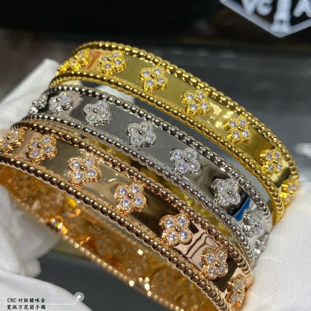 Van Cleef & Arpels Gold and Silver Flower Pattern Bracelets